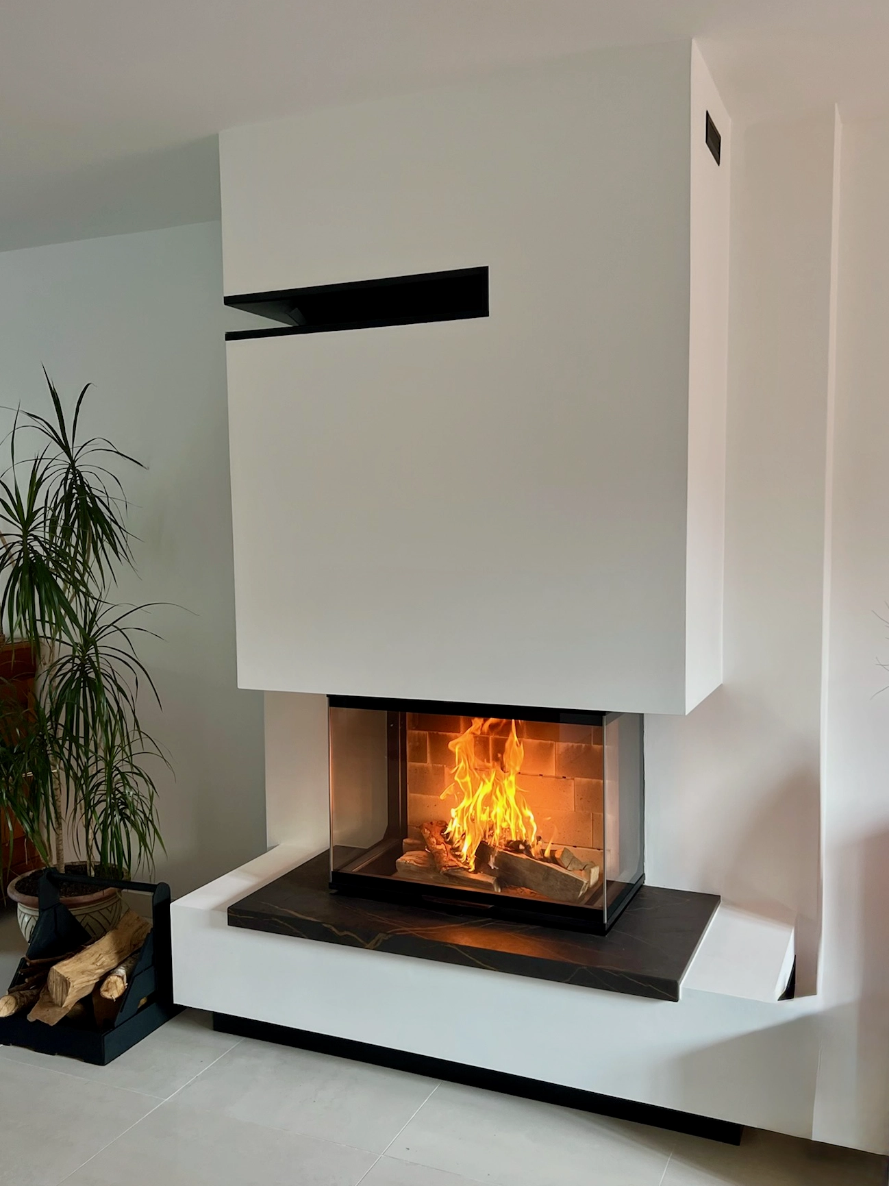 Insert à bois Atra 3 faces 800 dans une maison contemporaine à Avenay