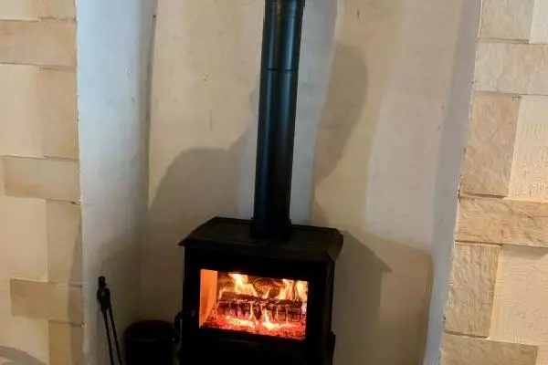 Réalisation à Langrune sur mer d'un poêle à bois Jotul F100