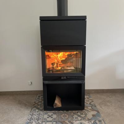 Un poêle à bois Jøtul F520 installé à Merville-Franceville