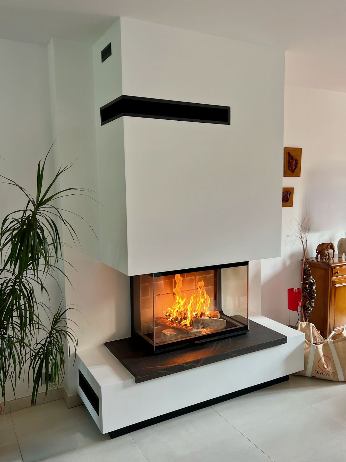 Insert à bois Atra 3 faces 800 dans une maison contemporaine à Avenay